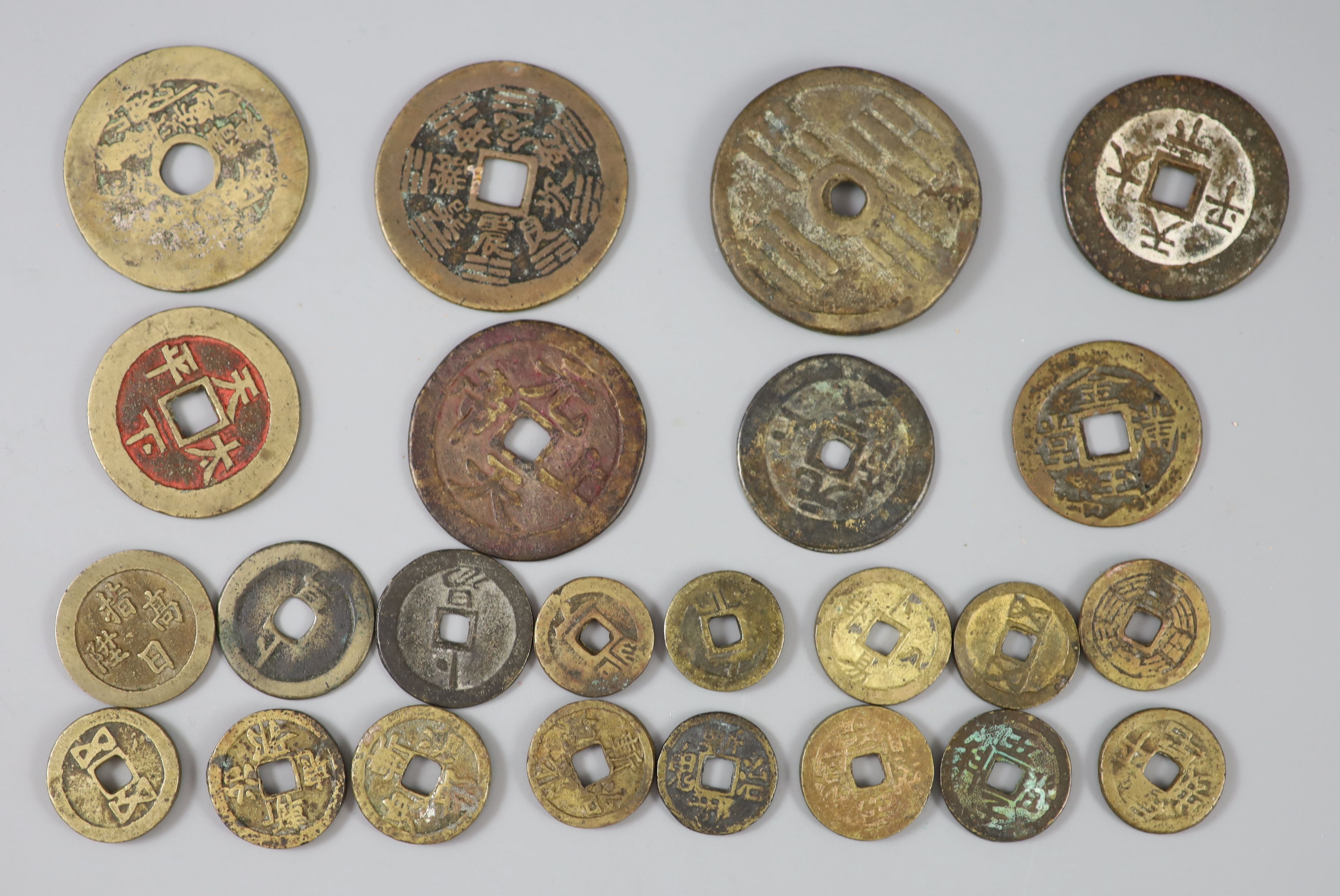 China, 24 bronze charms or amulets, Qing dynasty,